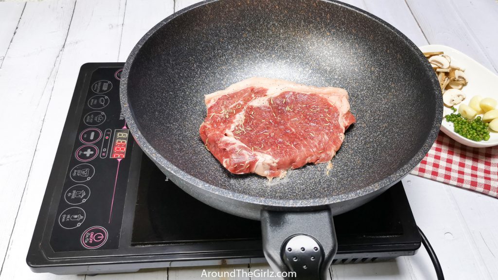 Heat up the pan and put the steak inside